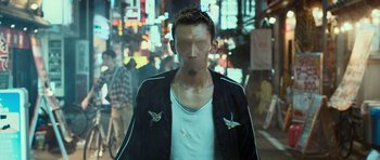 Movie still from “Valentino Khan - Deep Down Low” (2016), directed by Ian Pons Jewell – Extreme Close Up shot, Over the shoulder angle