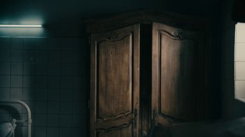 Movie still from “David Bowie - Lazarus” (2016), directed by Johan Renck – Medium shot, Low angle