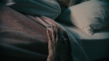 Movie still from “David Bowie - Lazarus” (2016), directed by Johan Renck – Extreme Close Up shot, Overhead angle