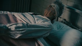 Movie still from “David Bowie - Lazarus” (2016), directed by Johan Renck – Extreme Close Up shot, Overhead angle
