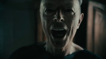 Movie still from “David Bowie - Lazarus” (2016), directed by Johan Renck – Close Up shot, Low angle