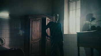 Movie still from “David Bowie - Lazarus” (2016), directed by Johan Renck – Wide shot, Low angle