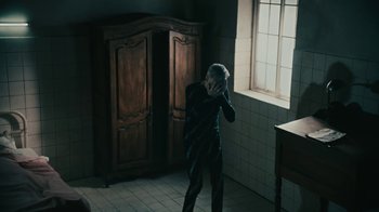 Movie still from “David Bowie - Lazarus” (2016), directed by Johan Renck – Medium shot, High angle