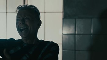 Movie still from “David Bowie - Lazarus” (2016), directed by Johan Renck – Close Up shot, Low angle