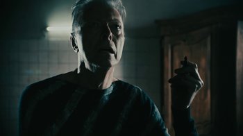 Movie still from “David Bowie - Lazarus” (2016), directed by Johan Renck – Close Up shot, Low angle