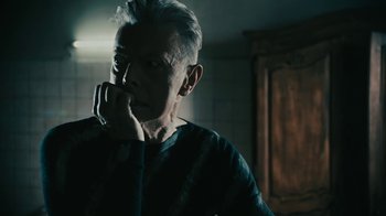 Movie still from “David Bowie - Lazarus” (2016), directed by Johan Renck – Close Up shot, Over the shoulder angle