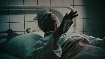 Movie still from “David Bowie - Lazarus” (2016), directed by Johan Renck – Extreme Close Up shot, Overhead angle