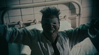 Movie still from “David Bowie - Lazarus” (2016), directed by Johan Renck – Close Up shot, Overhead angle