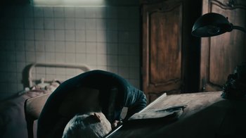 Movie still from “David Bowie - Lazarus” (2016), directed by Johan Renck – Medium shot, High angle