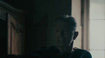 Movie still from “David Bowie - Lazarus” (2016), directed by Johan Renck – Close Up shot, High angle