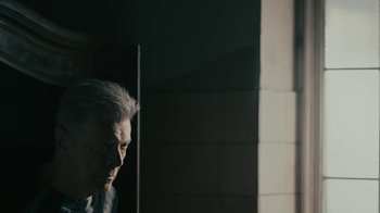 Movie still from “David Bowie - Lazarus” (2016), directed by Johan Renck – Medium shot, High angle