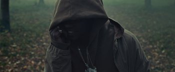 Movie still from “Travis Scott & Kanye West - Piss on your Grave” (2015), directed by Nabil Elderkin – Close Up shot, High angle