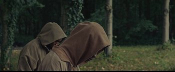 Movie still from “Travis Scott & Kanye West - Piss on your Grave” (2015), directed by Nabil Elderkin – Medium shot, High angle