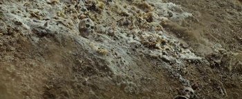 Movie still from “Travis Scott & Kanye West - Piss on your Grave” (2015), directed by Nabil Elderkin – Extreme Close Up shot, Overhead angle