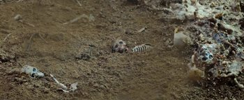 Movie still from “Travis Scott & Kanye West - Piss on your Grave” (2015), directed by Nabil Elderkin – Extreme Close Up shot, Overhead angle