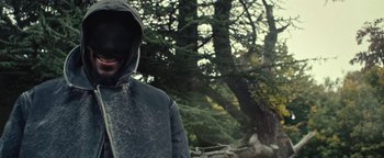 Movie still from “Travis Scott & Kanye West - Piss on your Grave” (2015), directed by Nabil Elderkin – Close Up shot, Low angle