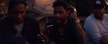 Movie still from “A$AP Rocky - Everyday” (2015), directed by Manu Cossu – Close Up shot, Over the shoulder angle