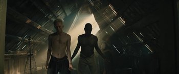 Movie still from “David Bowie - Blackstar” (2015), directed by Johan Renck – Medium shot, Low angle