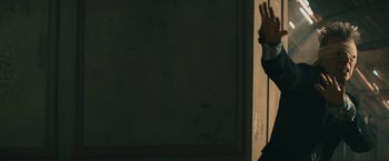 Movie still from “David Bowie - Blackstar” (2015), directed by Johan Renck – Medium shot, Low angle