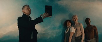 Movie still from “David Bowie - Blackstar” (2015), directed by Johan Renck – Medium shot, Low angle