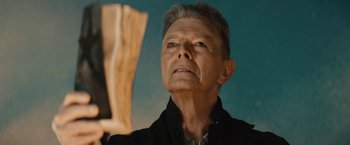 Movie still from “David Bowie - Blackstar” (2015), directed by Johan Renck – Close Up shot, Low angle
