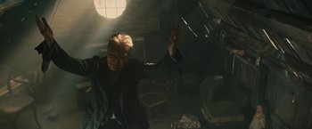 Movie still from “David Bowie - Blackstar” (2015), directed by Johan Renck – Medium shot, Low angle