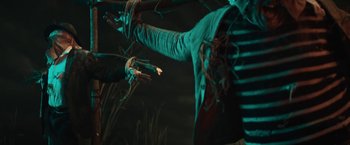 Movie still from “David Bowie - Blackstar” (2015), directed by Johan Renck – Medium shot, Low angle