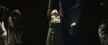 Movie still from “David Bowie - Blackstar” (2015), directed by Johan Renck – Medium shot, Low angle