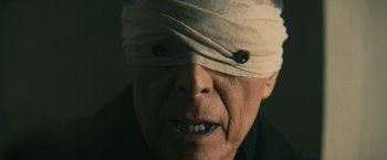 Movie still from “David Bowie - Blackstar” (2015), directed by Johan Renck – Extreme Close Up shot, High angle