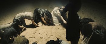 Movie still from “David Bowie - Blackstar” (2015), directed by Johan Renck – Wide shot, High angle