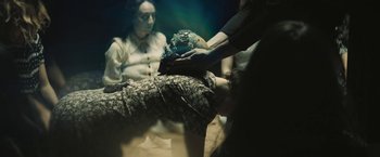 Movie still from “David Bowie - Blackstar” (2015), directed by Johan Renck – Medium shot, High angle