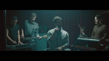 Movie still from “Foals - Give It All” (2015), directed by Nabil Elderkin – Medium shot, Low angle