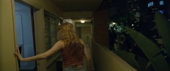 Movie still from “Florence & The Machine - Delilah” (2015), directed by Vincent Haycock – Medium shot, Over the shoulder angle