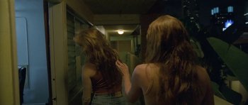 Movie still from “Florence & The Machine - Delilah” (2015), directed by Vincent Haycock – Medium shot, Low angle