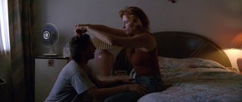 Movie still from “Florence & The Machine - Delilah” (2015), directed by Vincent Haycock – Medium shot, Low angle
