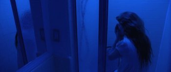 Movie still from “Florence & The Machine - Delilah” (2015), directed by Vincent Haycock – Medium shot, High angle