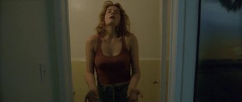 Movie still from “Florence & The Machine - Delilah” (2015), directed by Vincent Haycock – Medium shot, Low angle