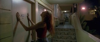 Movie still from “Florence & The Machine - Delilah” (2015), directed by Vincent Haycock – Medium shot, Low angle
