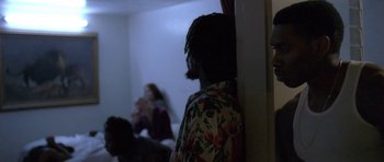 Movie still from “Florence & The Machine - Delilah” (2015), directed by Vincent Haycock – Medium shot, Over the shoulder angle