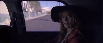 Movie still from “Florence & The Machine - Delilah” (2015), directed by Vincent Haycock – Close Up shot, Over the shoulder angle
