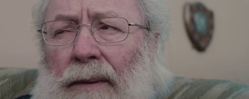 Movie still from “Gilligan Moss - Ceremonial” (2015), directed by Oscar Hudson – Extreme Close Up shot, Low angle