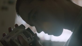 Movie still from “Cold Specks - Neuroplasticity” (2015), directed by Young Replicant – Extreme Close Up shot, Low angle