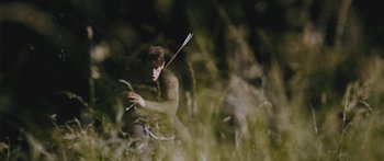 Movie still from “Alt-J - Hunger of the Pine” (2015), directed by Nabil Elderkin – Medium shot, Low angle