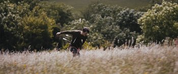 Movie still from “Alt-J - Hunger of the Pine” (2015), directed by Nabil Elderkin – Medium shot, Low angle