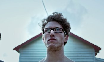 Movie still from “Sheep Dog & Wolf - Breathe” (2015), directed by Thunderlips – Close Up shot, Low angle