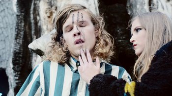 Movie still from “The Leers - I Can’t Cope” (2015), directed by Thunderlips – Medium shot, Overhead angle
