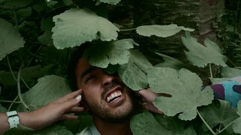 Movie still from “The Leers - I Can’t Cope” (2015), directed by Thunderlips – Close Up shot, Overhead angle