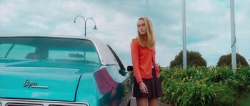 Movie still from “LarzRanda - Lifeguard” (2015), directed by Thunderlips – Medium shot, Low angle