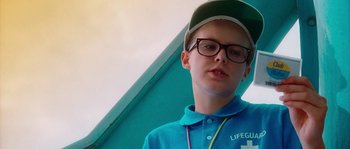 Movie still from “LarzRanda - Lifeguard” (2015), directed by Thunderlips – Close Up shot, Low angle