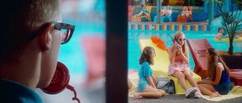 Movie still from “LarzRanda - Lifeguard” (2015), directed by Thunderlips – Medium shot, Overhead angle